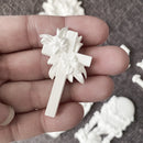 Close-up lily cross casting from Eternal Spring Faith mold—raised embellishment for Easter and faith decor projects