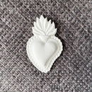 Flaming sacred heart embellishment casting from ReDesign with Prima The Love Edit 5x8 silicone mold