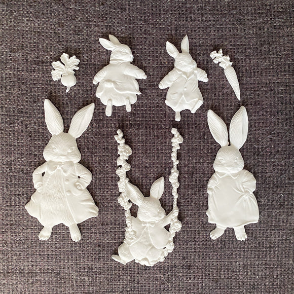 ReDesign with Prima Bunny Trail Tales 5x8 silicone mold resin cast set with bunny figures, swing scene, carrot, radish, and floral garland embellishments