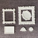 Miniature Grace Frames silicone mold castings—white ornate square and oval vintage frames with crest and medallion embellishments