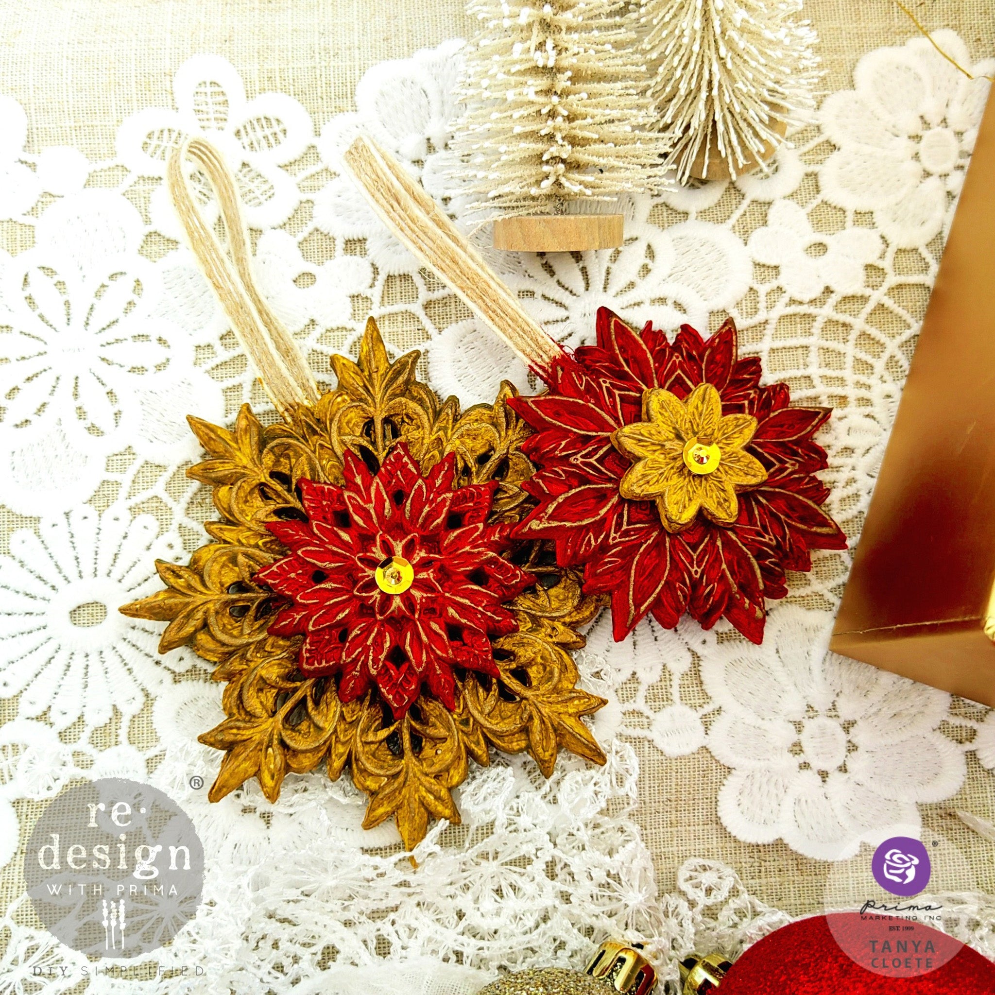 Red and gold floral snowflake ornaments created by Tanya Cloete are made from ReDesign with Prima's Papercraft Charms silicone mold. 