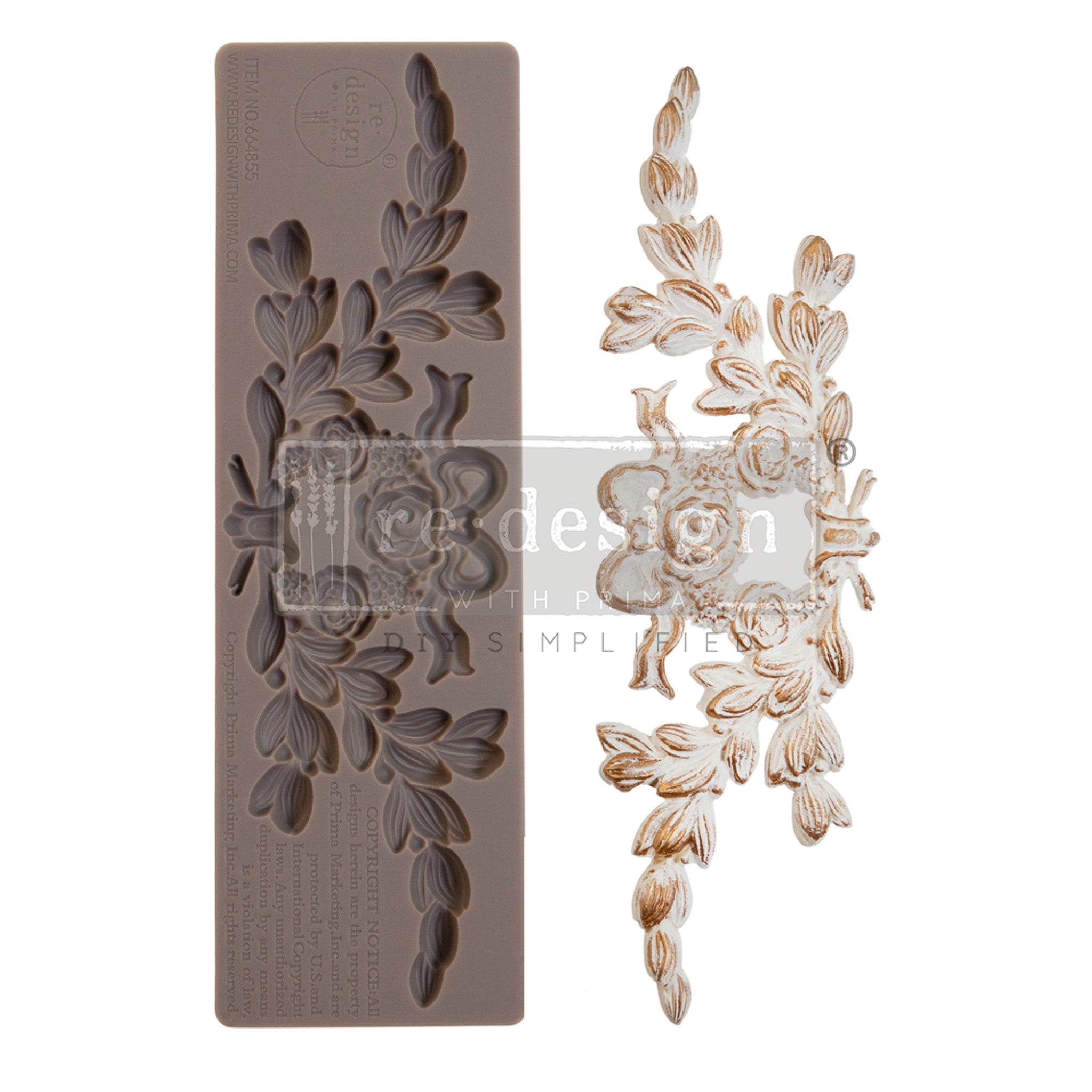 A brown silicone mould and its white and gold casting of a rose and leaves garland design are on a white background.