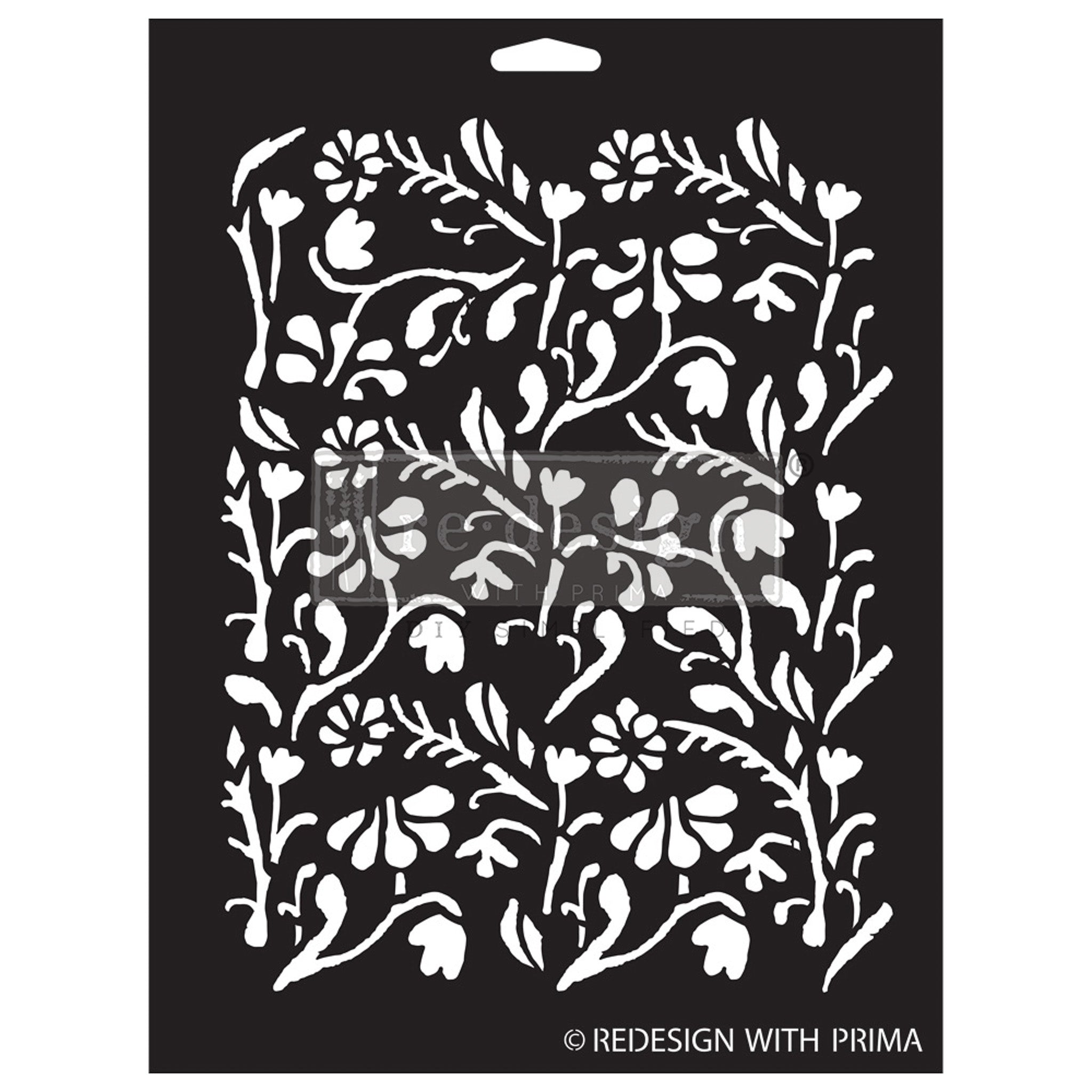A black stencil against a white background that features a dainty floral design.