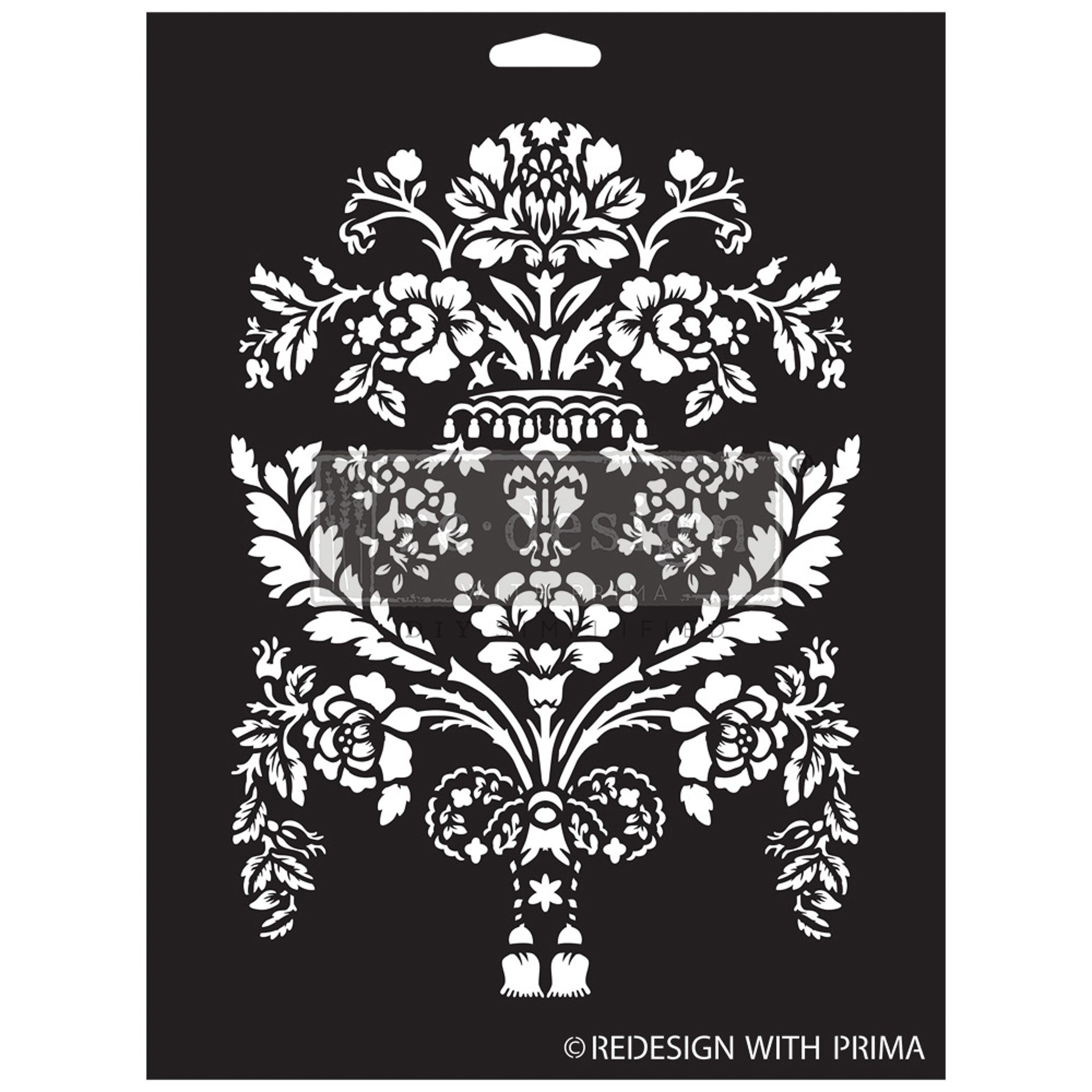 A black stencil against a white background that features a floral design with foliage in the shape of a large European vintage vase.