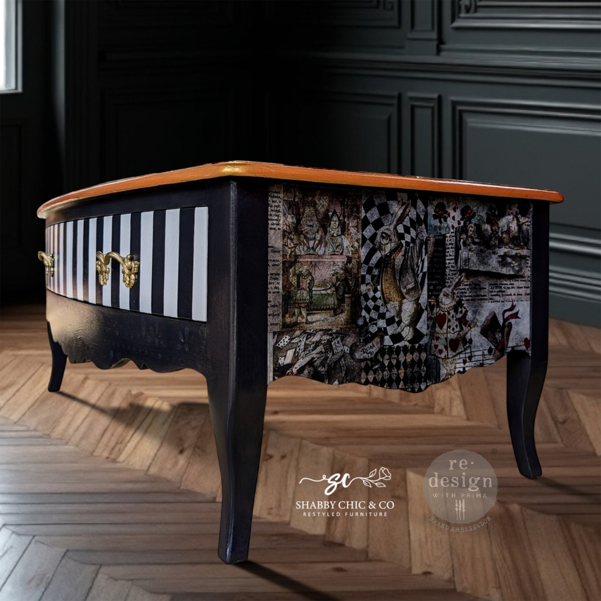 A vintage coffee table with storage refurbished by Shabby Chic and Company is painted black with a natural wood top and features ReDesign with Prima's Curious Journey tissue paper on the sides.