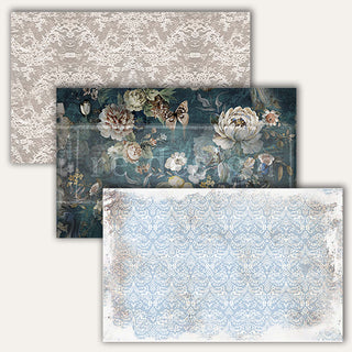 Three tissue papers that feature a stunning jewel-toned backdrop with gorgeous flowers and butterflies, and gray and blue Victorian-inspired patterns.