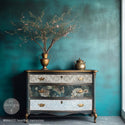 A vintage 3-drawer dresser is painted dark teal with bronze accents and features the Heartfelt Memories tissue papers on its drawers.