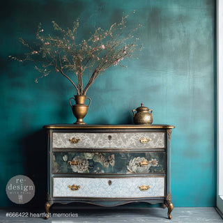 A vintage 3-drawer dresser is painted dark teal with bronze accents and features the Heartfelt Memories tissue papers on its drawers.