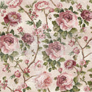 Close-up of a fiber paper featuring a soft creamy blush background with mauve and pink roses on winding branches. 
