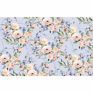 Tissue paper design of soft pink and blue floral bouquet with green leaves connected by small twigs strewn about against a soft lavender background.