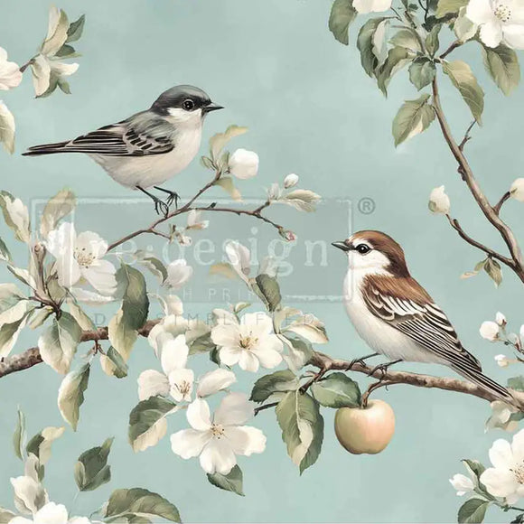 Close-up of Whispering Wings A3 fiber decoupage paper showing detailed birds, white blossoms, and leafy branches on pale blue
