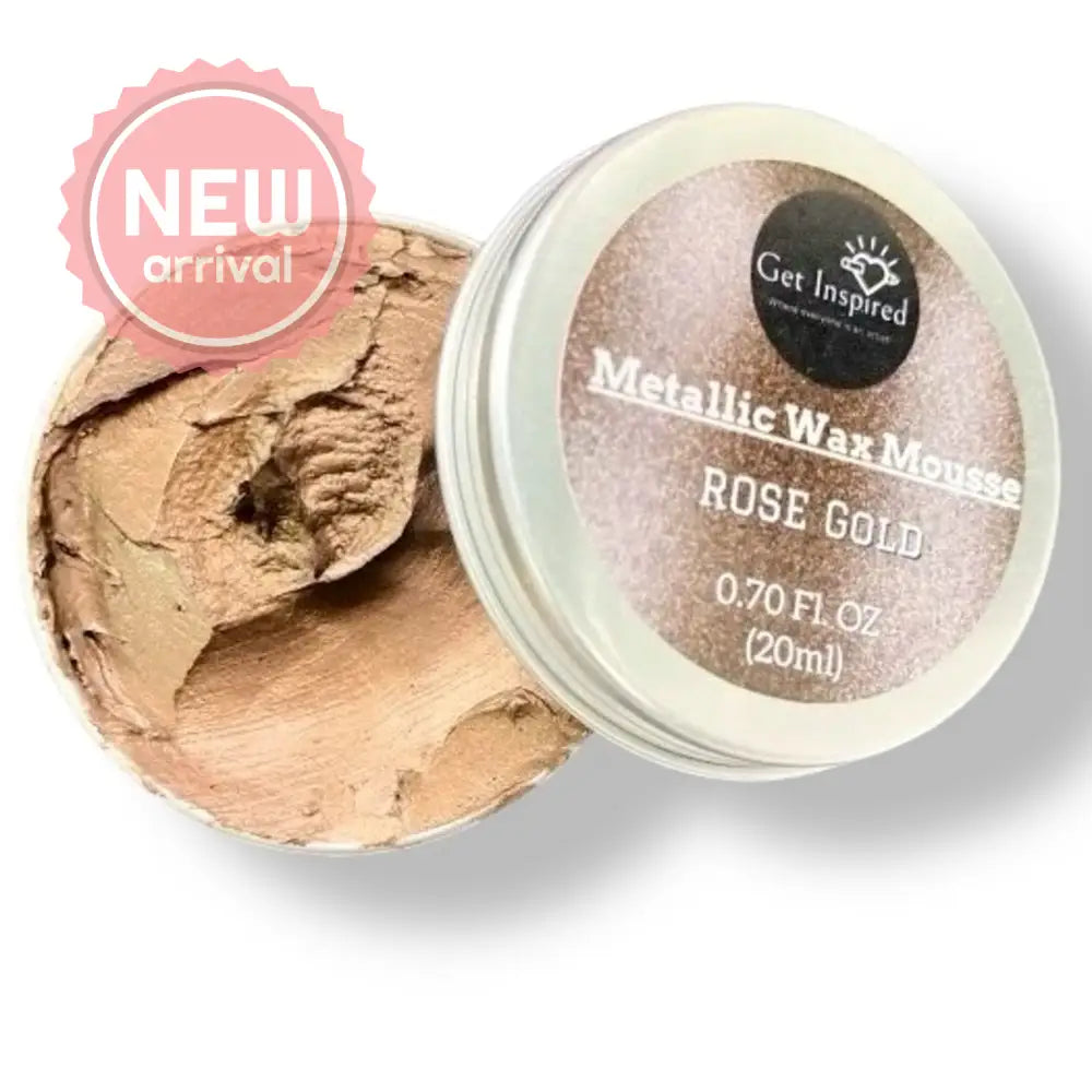 A 0.70 (20 ml) open container of a rose gold color metallic wax mousse paste is against a white background.