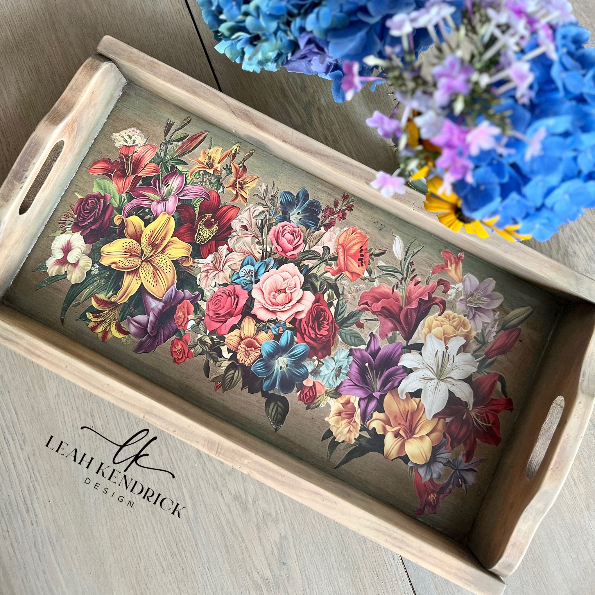 A vintage wood tool box created by Leah Kendrick Design features Belles & Whistles' Antique Flora small rub-on transfer inside on the bottom of the box.