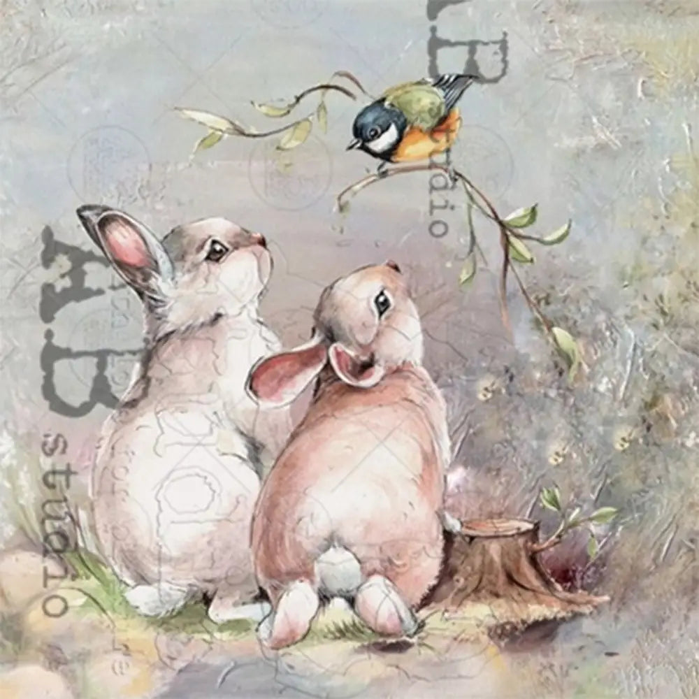 Close-up of an A4 rice paper featuring 2 adorable bunnies looking up at a small bird on a branch.