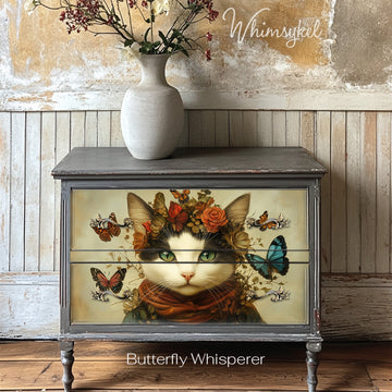 A 2-drawer nightstand features Whimsykel's Butterfly Whisperer tissue paper on its drawers.