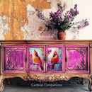 A vintage buffet table features Whimsykel's Cardinal Companions tissue paper on its 2 center doors.