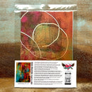 A package of Whimsykel's Colorful Echoes tissue paper is against a wood background.