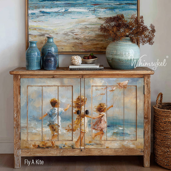 Decorative sideboard with beach-themed design and Whimsykel branding