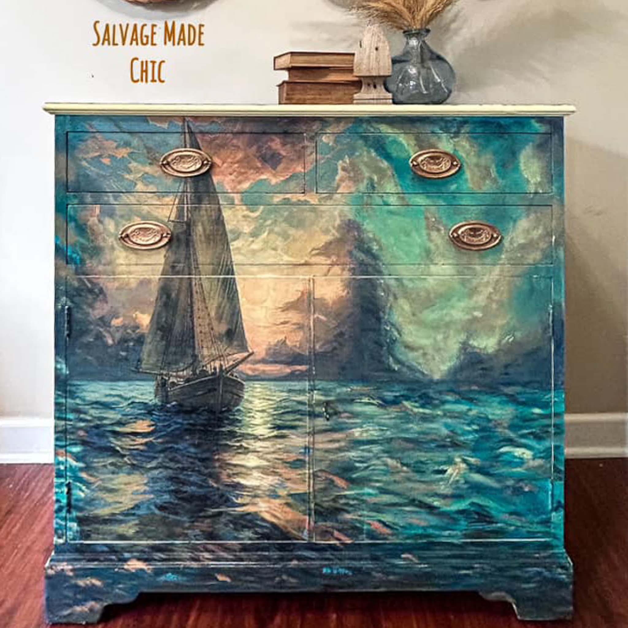 A small buffet console table refurbished by Salvage Made Chic features Whimsykel's Nautical Serenity tissue paper on the front.