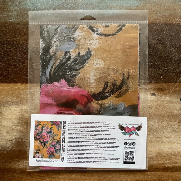Packaged product with decorative paper and instructions on a wooden surface