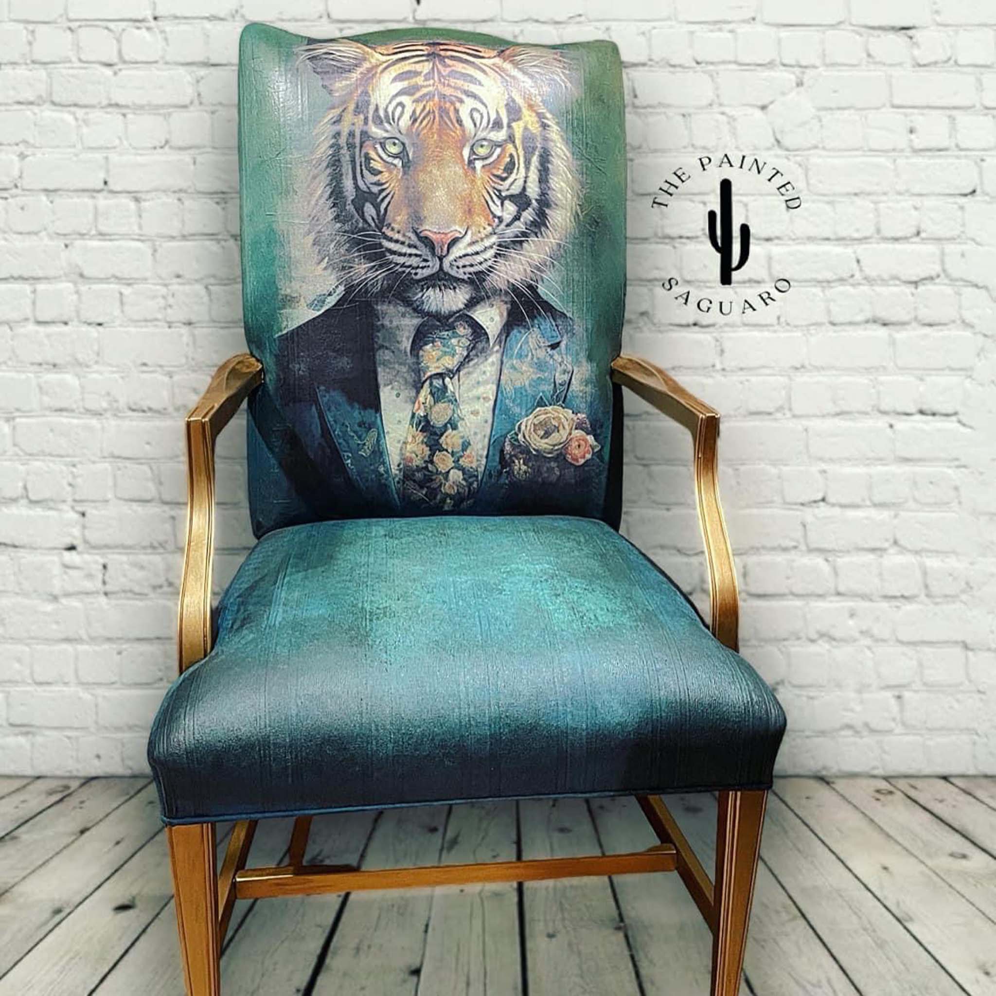 A vintage arm chair refurbished by The Painted Saguaro features Whimsykel's Sebastian Tiger tissue paper on the front of the back seat.