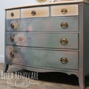 Vintage dresser makeover using Whimsykel Weathered Roses floral decoupage paper on drawer fronts