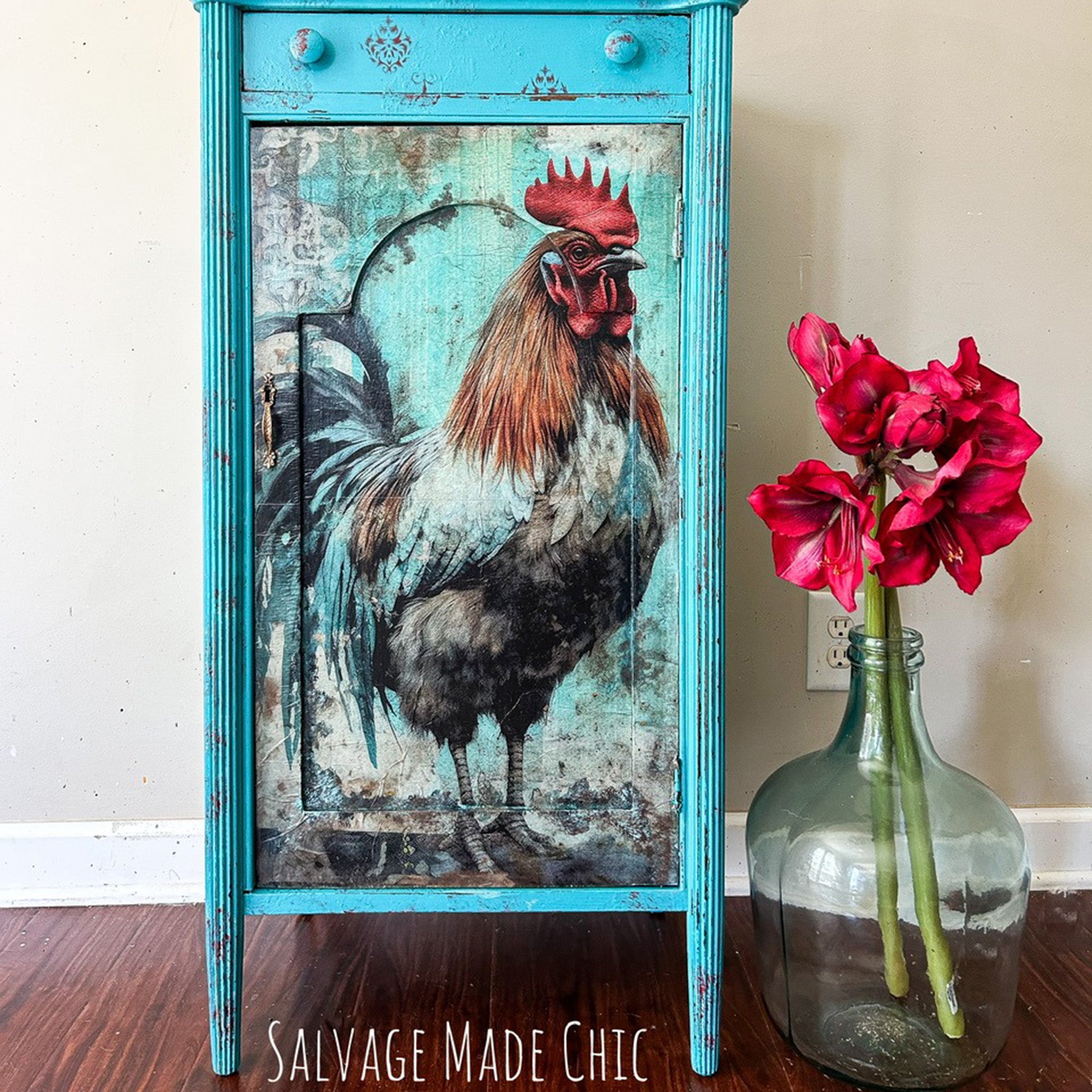 A vintage side table with storage refurbished by Salvage Made Chic is painted sky blue and features Whimsykel's Hues & Feathers tissue paper on its door.