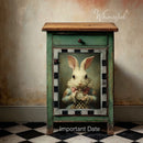 Whimsykel Important Date decoupage paper applied to a vintage green nightstand door panel with white rabbit and pocket watch artwork