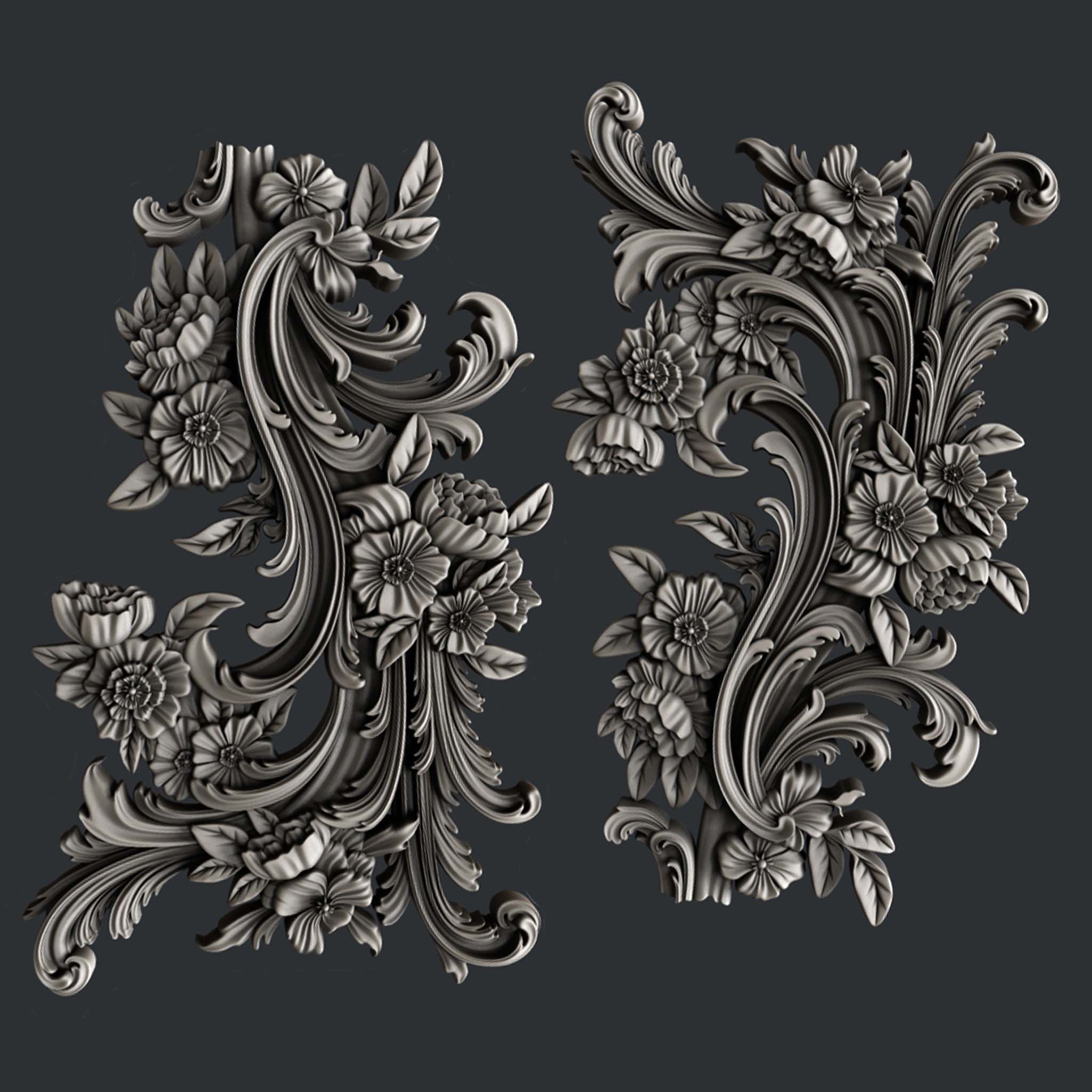 Silver colored silicone mold castings featuring 2 small ornate floral flourish accent pieces are against a dark grey background.