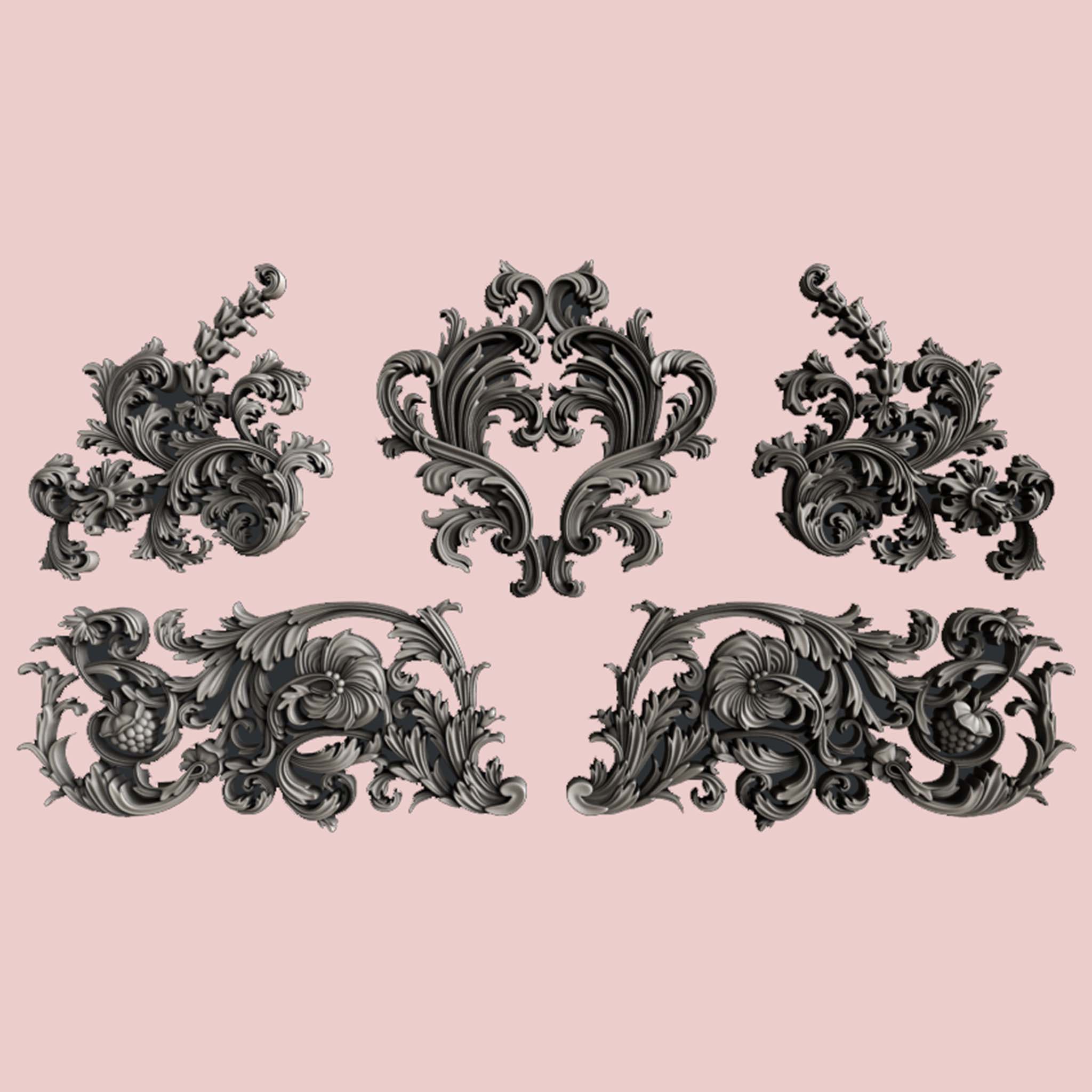 Silver colored castings of 5 ornate flourish accent pieces are against a light pink background.