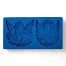 Blue Zuri Cherub Twins silicone mold with two detailed winged cherub cavities for casting embellishments
