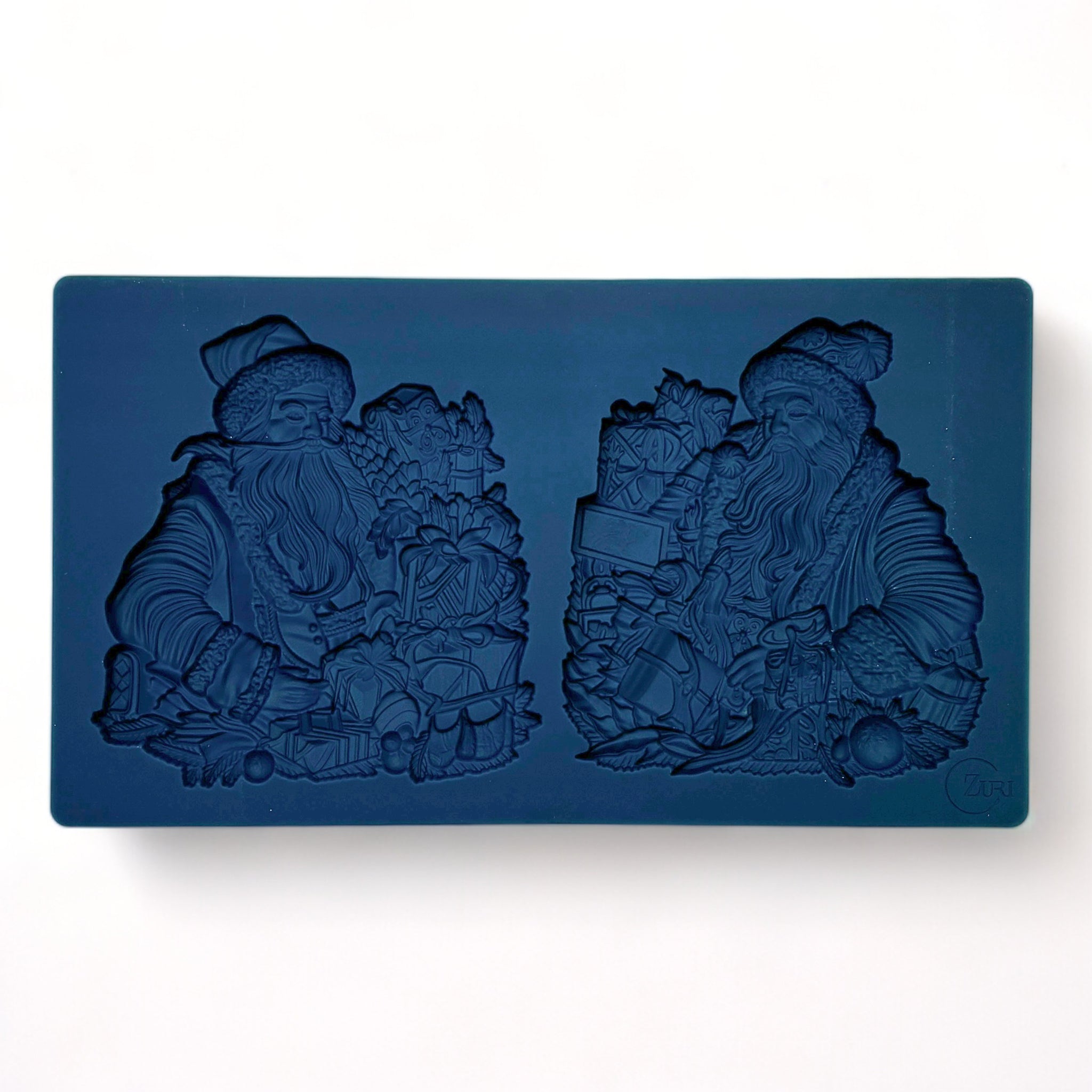 A blue silicone mold of Zuri Design's Father Christmas is against a white background.