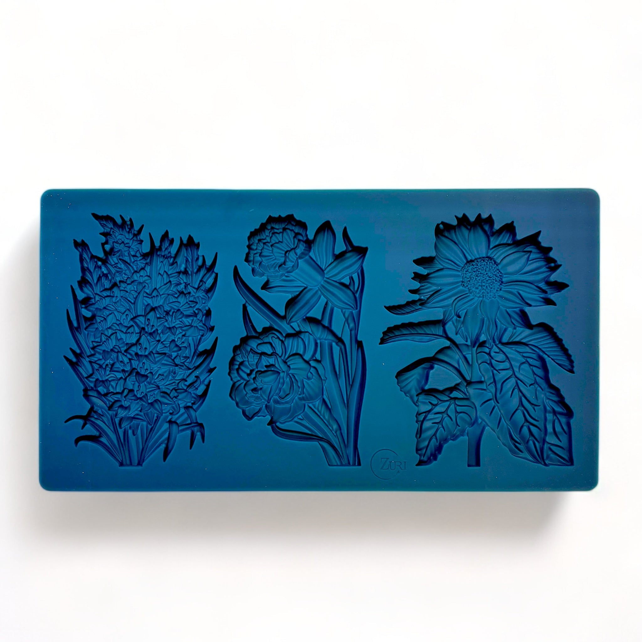 A blue silicone mold of Zuri Design's Flower Blooms Set 1 is against a white background.