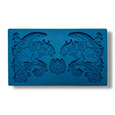 A blue silicone mold featuring 2 large gargoyle statues and a smaller gargoyle medallion is against a white background.