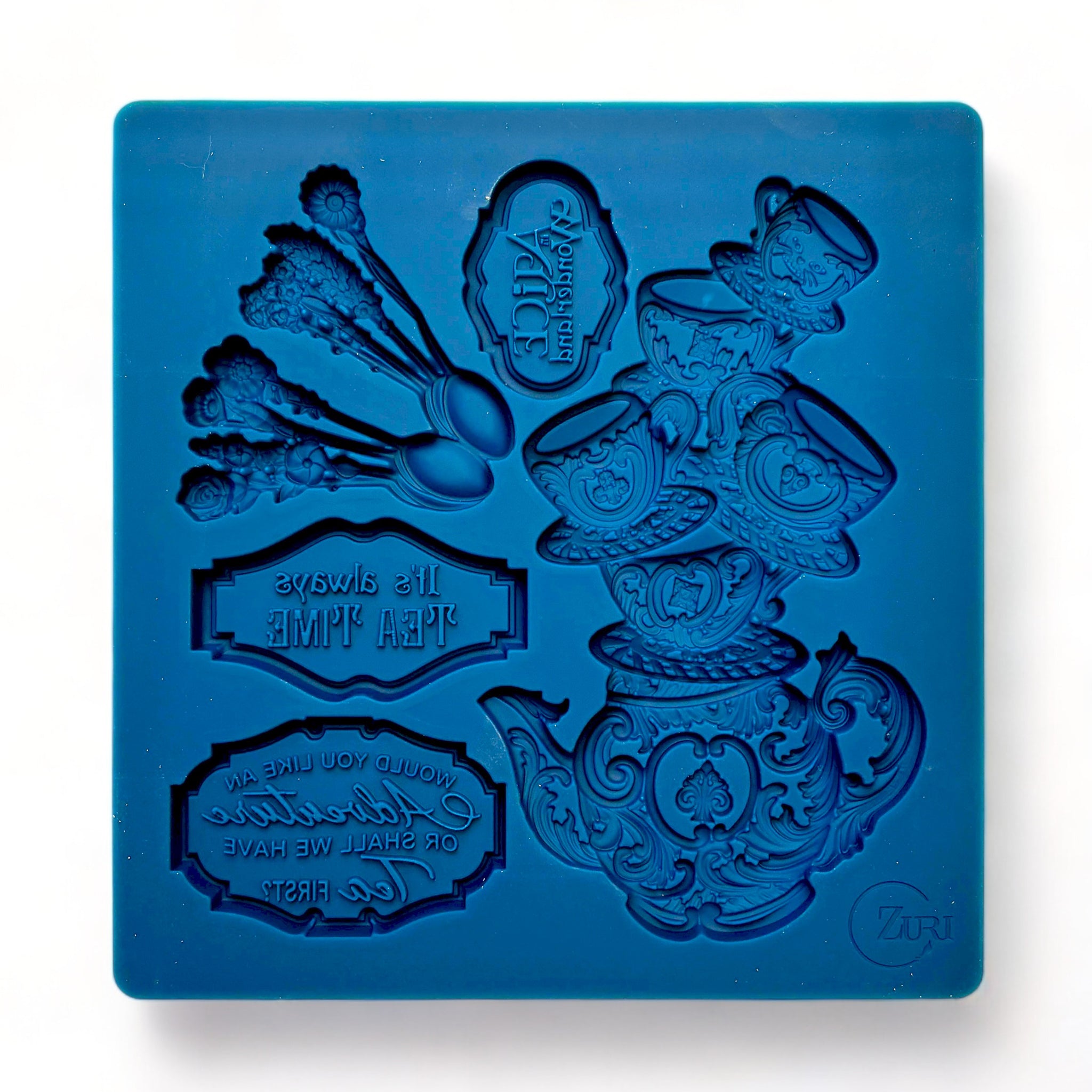 A blue silicone mold of Zuri Design's Tea Time is against a white background.