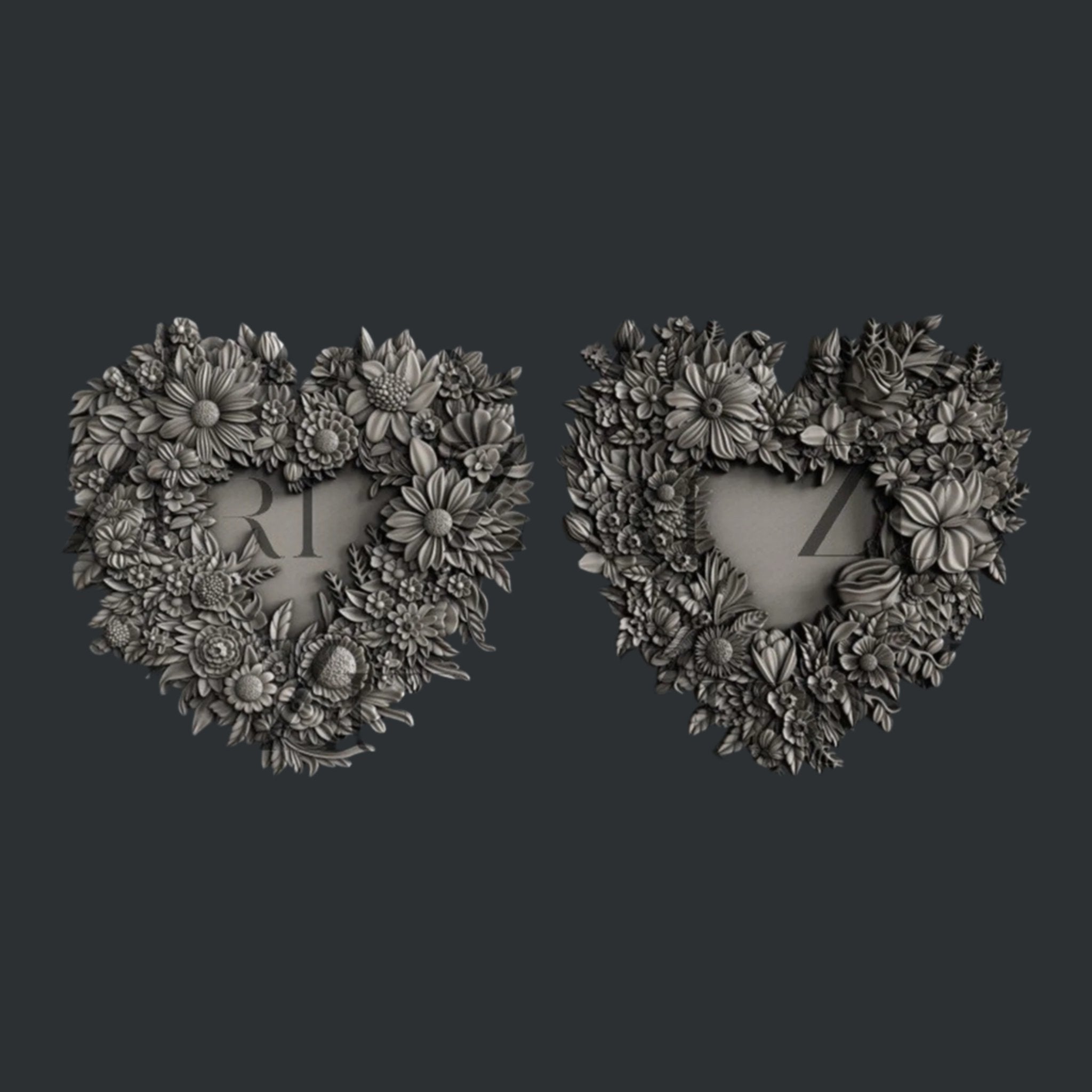 Silver colored silicone mold castings of 2 floral heart-shaped wreath frames are against a dark grey background.