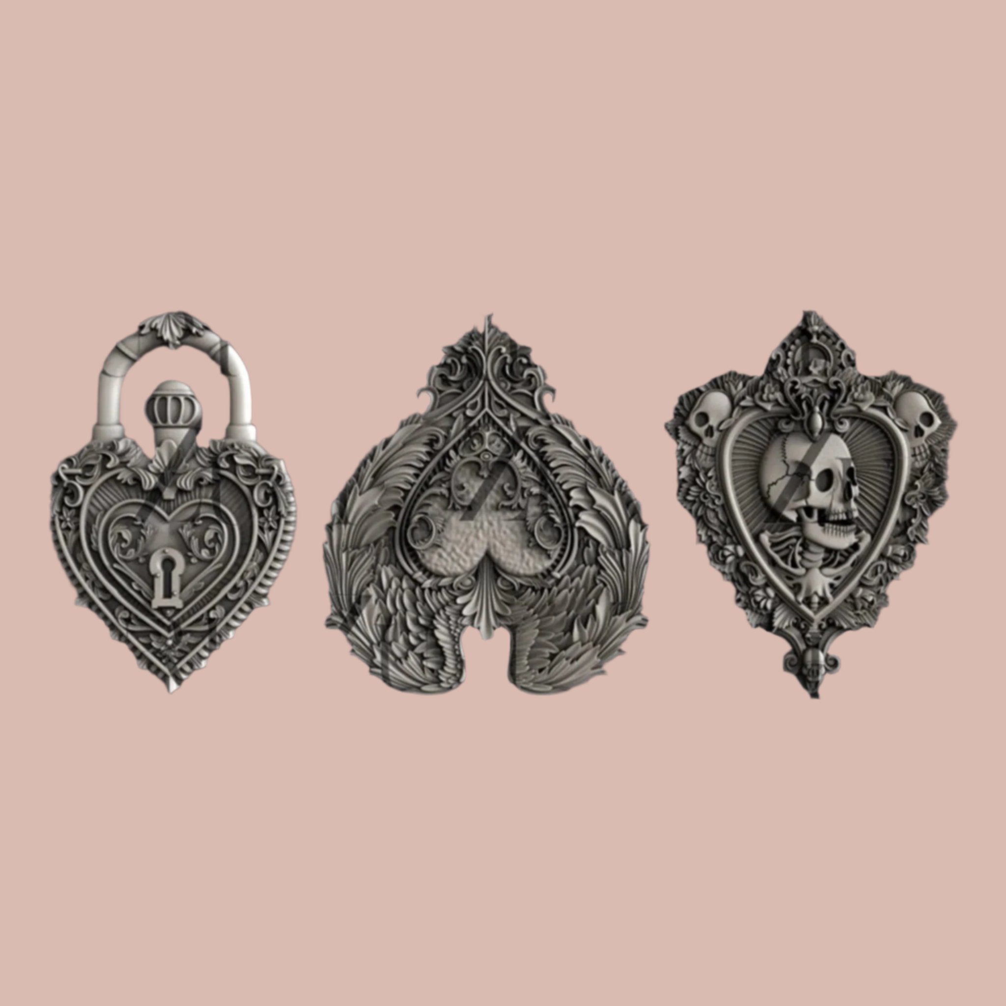 Silver colored silicone mold castings of 3 ornate hearts, one as a lock, one with feather wings, and one with skulls, are against a light pink background.