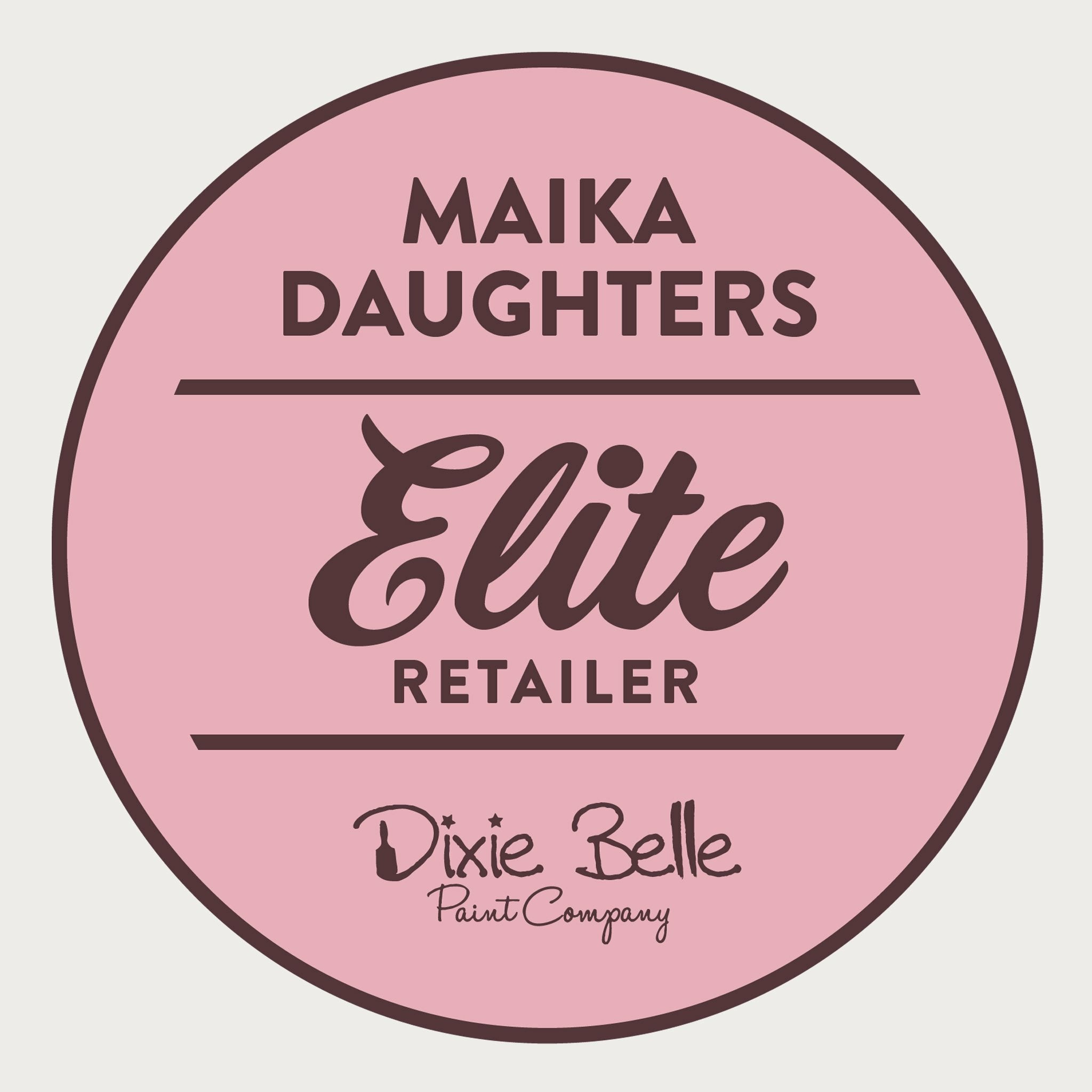 A white background with a pink circle with a brown outline and brown text reading: Maika Daughters. Elite retailer. Dixie Belle paint company.
