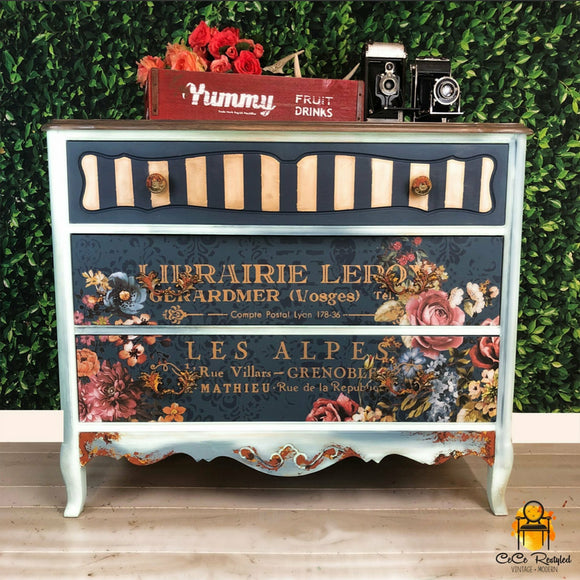 White and navy dresser with the ruby rose transfer on the drawers. A Coco Restyled vintage plus modern logo on the bottom right.