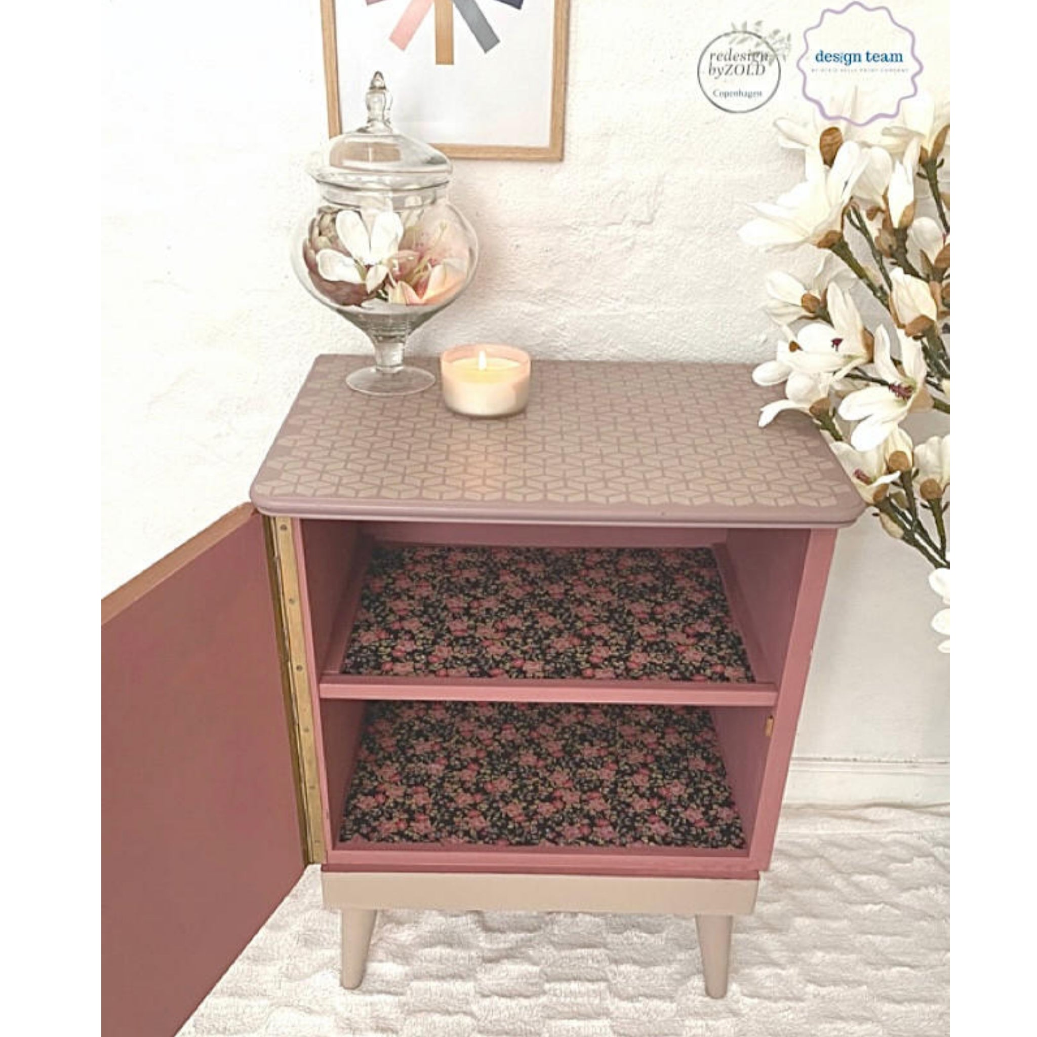 A vintage nightstand refurbished by Redesign by Zold Copenhagen is painted a rose pink and features the Peony Pattern A1 rice paper inside on its 2 shelves.