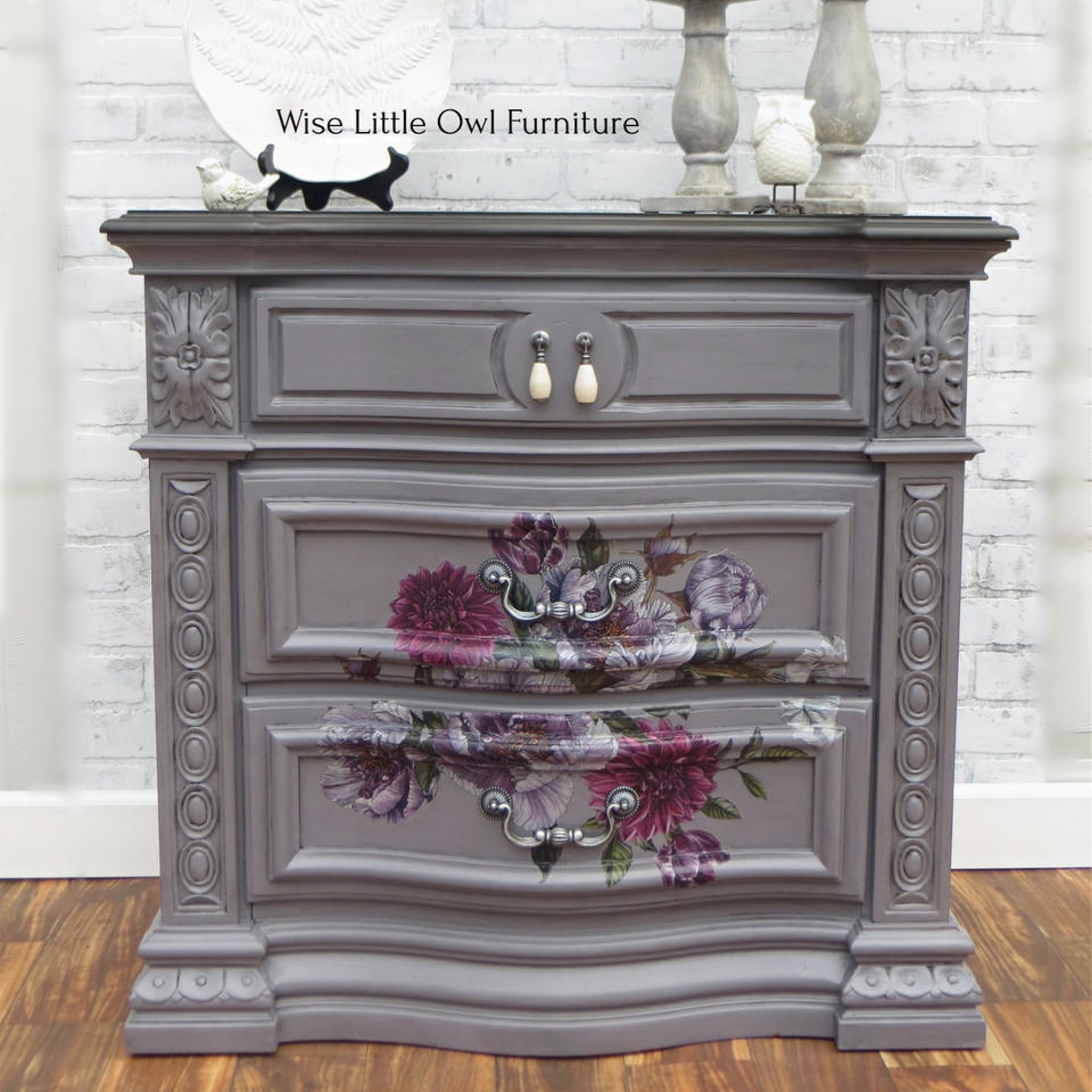 A vintage 3-drawer nightstand refurbished by Wise Little Owl Furniture is painted light gray and features Buds and Branches on its lower 2 drawers.