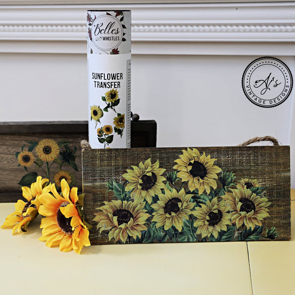 Small wood projects created by AJ's Vintage Designs feature the Sunflower transfer. The Belles & Whistles Sunflower Transfer container stands behind one of the wood projects.