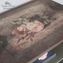 A wood project refurbished by Vintage Charm Homestead features the Sandrina rice paper in the center.