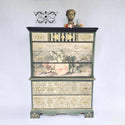 A vintage chest dresser refurbished by Blue Heart Designs features the Sandrina rice paper on its drawers.