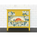 A 3 drawer dresser painted yellow with the Skull Chinoiserie tissue paper decoupaged across the drawers.