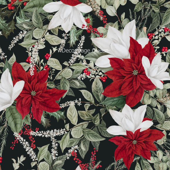 Close-up of a rice paper design of red and white poinsettias with leaves on a black background.