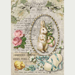 A4 rice paper that features vintage parchment with script writing, Spring flowers, a bunny inside a dainty frame, a baby chick and chicken eggs wrapped in blue ribbon. White borders are on the sides.