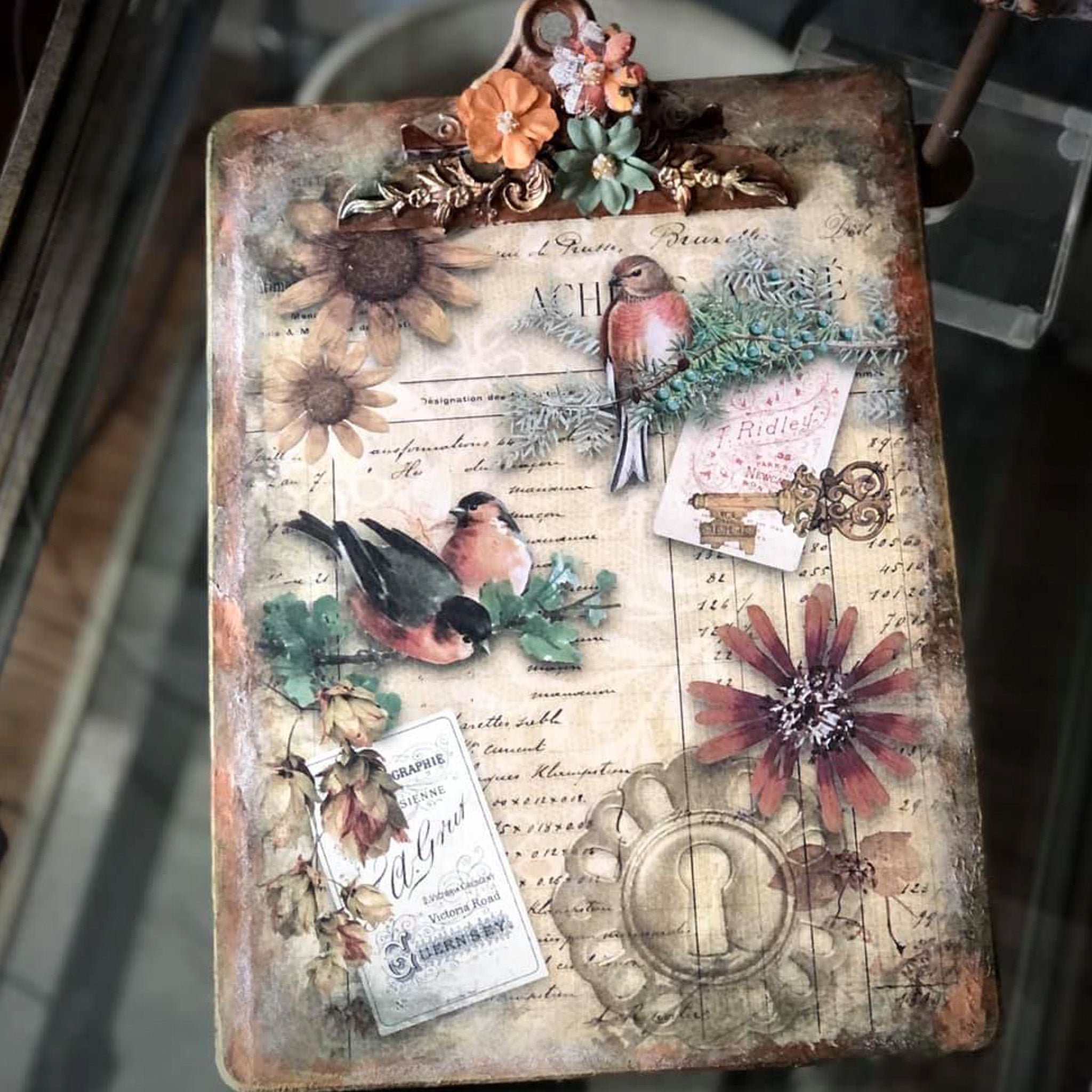 Rustic clip board with the Autumn Birds decoupage paper on top.