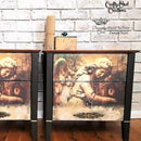 Two small black dressers with the Gothic Angel decoupage paper on top. A black Decoupage Queen , Elaine Norbury Design Team and Crafty Owl Creations logo on the top right.