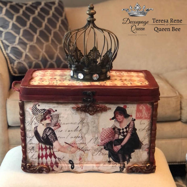 Tin box with the Iveta's Circus Girls decoupage paper on top. A black Decoupage Queen and Teresa Rene Queen Bee logo on the top right.
